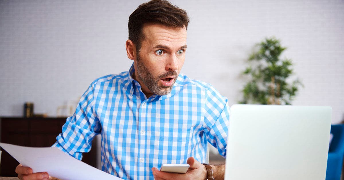 Shocked and worried businessman at work 